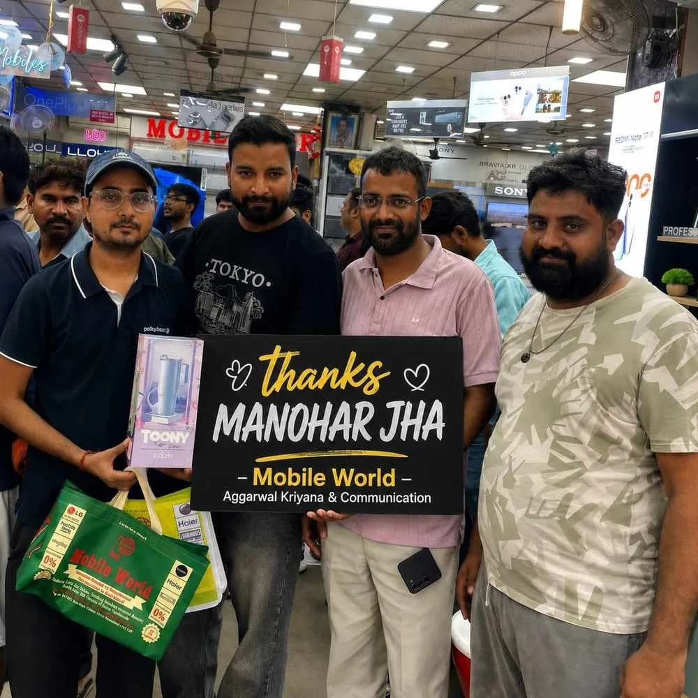 Customers with the Mobile World thank-you board